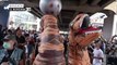 Thai students and dancing dinosaurs rally in Bangkok