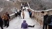 Tourist slides down Great Wall of China amid icy conditions
