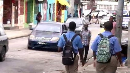 Wrong Book Bag Technique Causing Primary School Discomfort