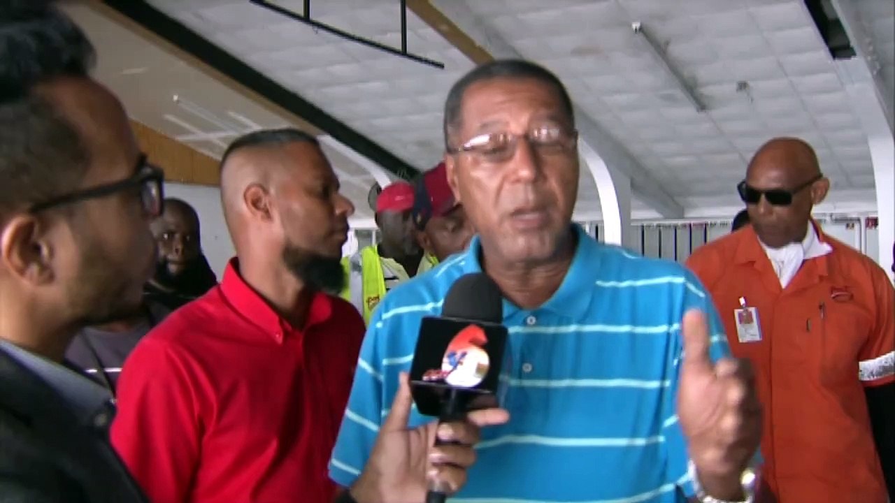 Port Cargo Workers Stage Sit Out