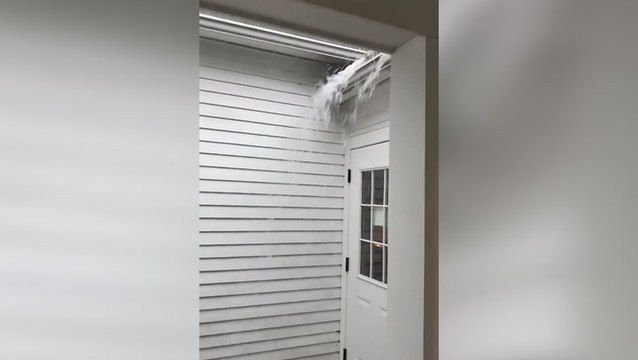 Heavy downpours flood gutters in Massachusetts