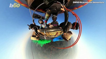 Sky DYE-ers Jump From a Hot Air Balloon Amidst a Rainbow Cloud of Dye Powder