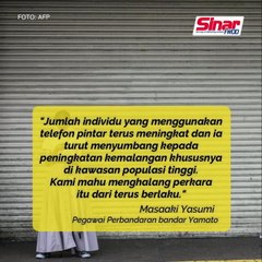 Larang guna telefon pintar sambil berjalan