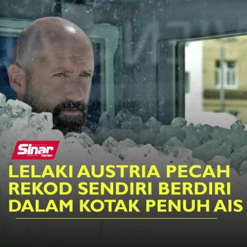 Lelaki Austria pecah rekod sendiri berdiri dalam kotak penuh ais
