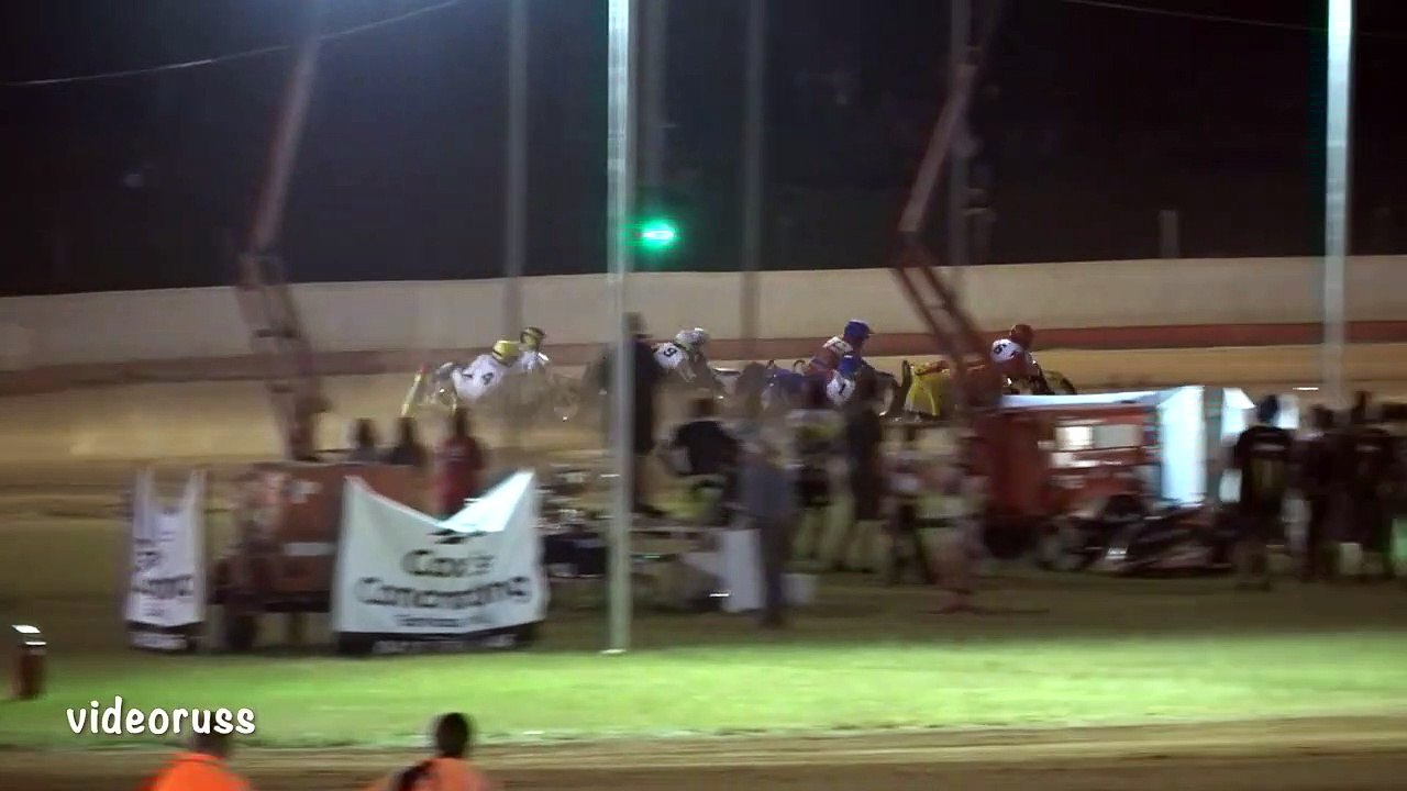 Sidecar Tumbles during Speedway Race