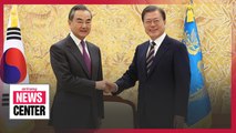 President Moon says S. Korea will not cease efforts for complete denuclearization in talks with Chinese FM