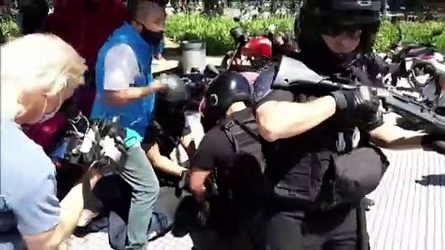 Chaos descends at Maradona's funeral as police and mourners clash