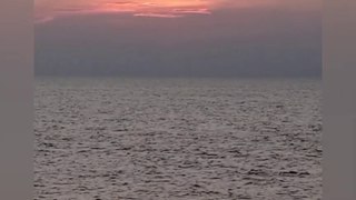 A beautiful sunset in the middle of the Bay of Bengal. Sunset with beautiful waves