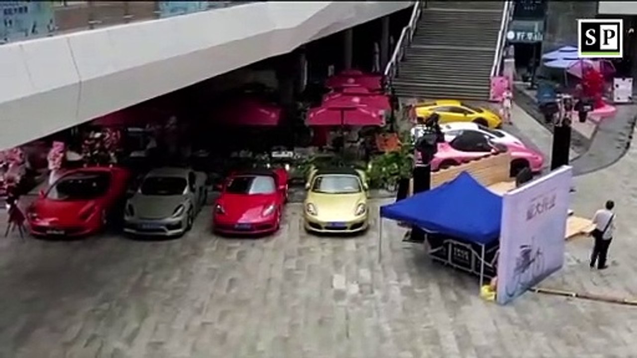 Porsche Lamborghini Ferrari car display at 1886 bar & restaurant in COCO Park Shenzhen, China
