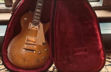 Signed guitars belonging to Liam Gallagher and Eric Clapton among sale to raise funds for out-of-work roadies