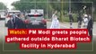 PM Modi greets people gathered outside Bharat Biotech facility in Hyderabad