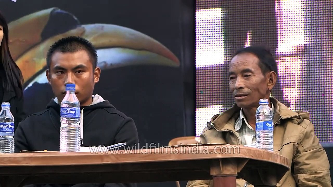 Look at this daring man eat hordes of King Chilly in Nagaland!