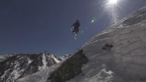 Skier Performs Difficult Trick And Jumps Off Of Ramp While Skiing At High Speed