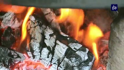 طهي المنسف على الحطب .. عادة أردنية أصيلة لم تغيرها الحداثة
