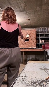 Girls Throws Throwing Knife into Another Knife