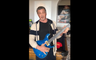 SYLVESTER STALLONE loving his brother's FRANK STALLONE TIGER electric guitar.