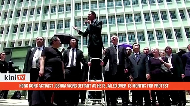 Hong Kong activist Joshua Wong defiant as he is jailed over 13 months for protest
