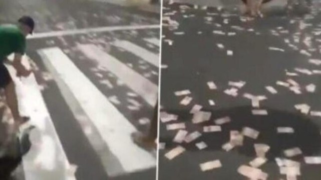 Brazil: Residents rush to collect cash after bank robbers scatter it on road