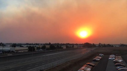 'It's kind of surreal.' Two wildfires on video in California