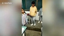 Chinese teacher suspended after forcing students to smash their phones in class