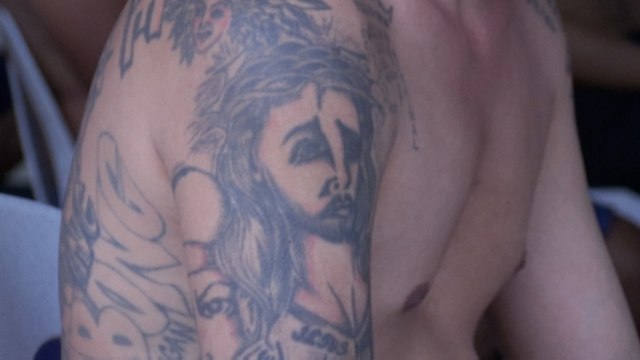 In the Philippines, gang tattoos of inmates are inked over by authorities to tackle jail violence