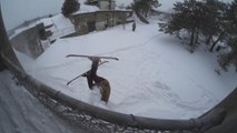 Skier Falls Into Heap Of Snow While Jumping Over Fence