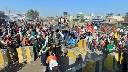 Farmers' Protest: Men protest, women work on fields