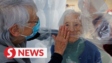 Cuddling in Covid: 'Hug bubble' lets French seniors feel the magic of touch