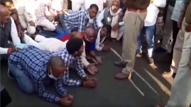 Farmers walk on knees in support of their stir in Delhi