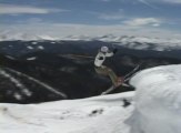 Skier Scorpions Into Snow While Jumping off of Piste