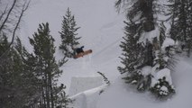 Skier Flips Over Snow Boulder and Crashes Into Snow After Hitting Tree