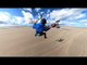 Guy Does Kiteboarding on the Beach