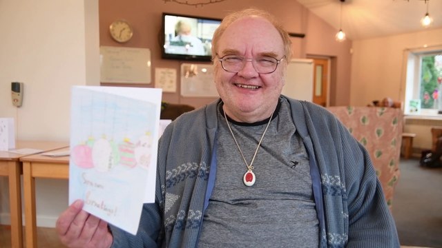 Milbanke Day Centre residents read Christmas cards from young school children