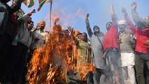 ‘Our children will starve’: Indian farmers defend protests against new laws as workers join strike