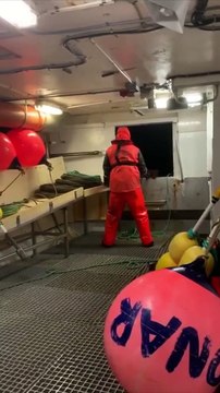 Rough Waves Wash Over Fishing Boat Crew