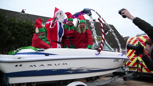 Man turns his speedboat into a sleigh to spread some festive joy