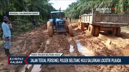 Personel Polsek Belitang Hulu Lewati Lumpur dan Banjir untuk Salurkan Logistik Pilkada