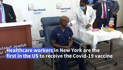 'I've been waiting for this day forever': first vaccinations in the US as death toll hits 300,000
