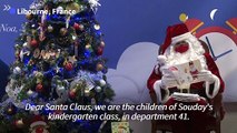 French children write to Santa Claus asking for gifts and urging him to stay healthy