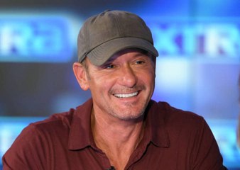 These Photos of Tim McGraw Decorating His Family’s Giant Christmas Might Give You Vertigo