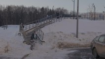 Guy Skies On Handrails And Slips As His Skiis Open