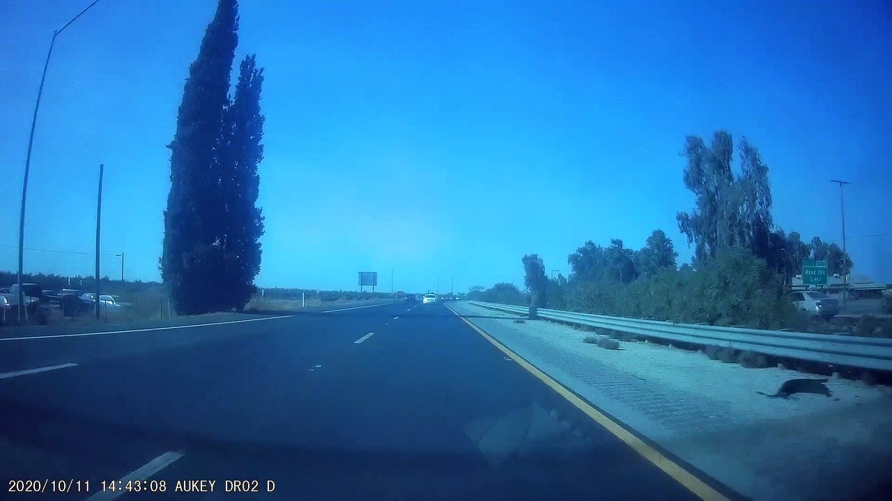 Overtaking Car Crashes into Barrier