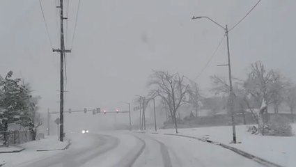 Snowstorm obscures road