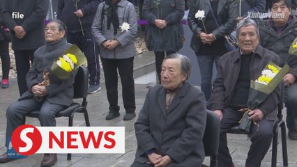 Nanjing Massacre survivors call for peace
