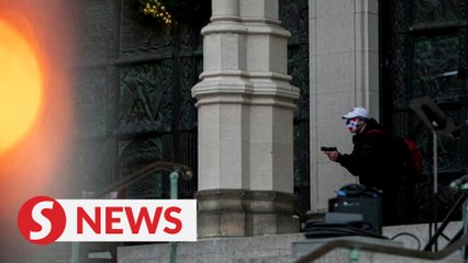 Gunman shot, killed by police outside NYC church