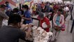 Long queues for free meals as millions in the Philippines go hungry amid coronavirus pandemic