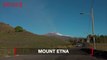 Mount Etna Erupts Casting Bright Red Lava and Billowing Ash Into the Air