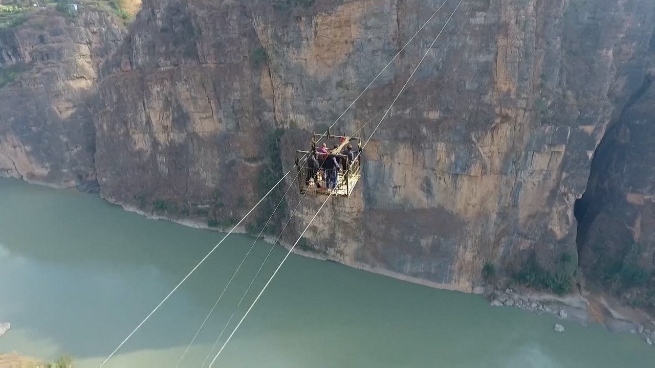 Thrilling commuter zip line ‘retires’ in southwest China after 20 years