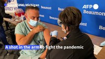 US Healthcare workers begin receiving Covid-19 vaccine