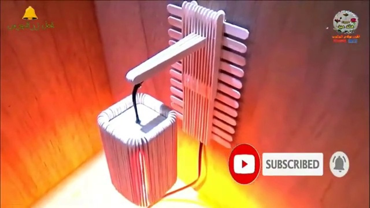 Making a lamp with icecream sticks-طريقة  صنع ابليك حائط مودرن من أعواد الايسكريم اجمل ديكور للمنزل